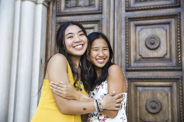 Two Scripps students hugging